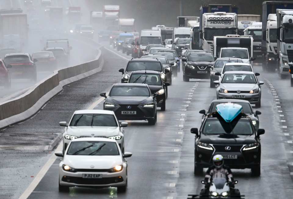 Heavy traffic on a wet M3 motorway today