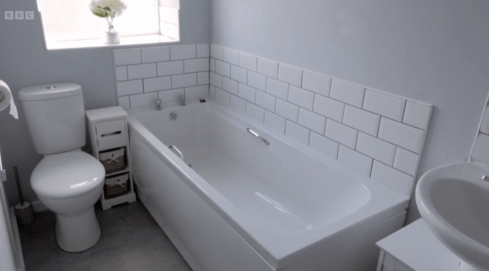 The stunning newly built bathroom was painted neutral