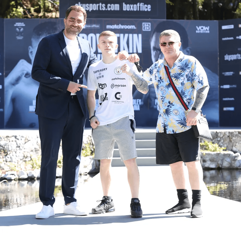 Campbell Hatton with his dad Ricky (right) and promoter Eddie Hearn (left)