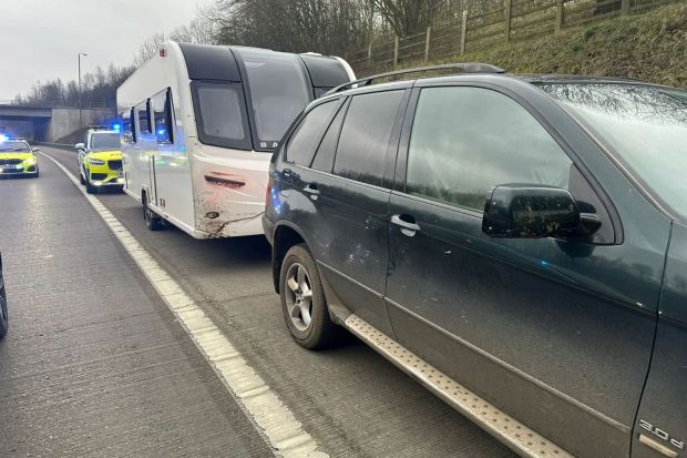 Cops have arrested a boy, 11, after he was found driving a BMW X5 on the M1 motorway