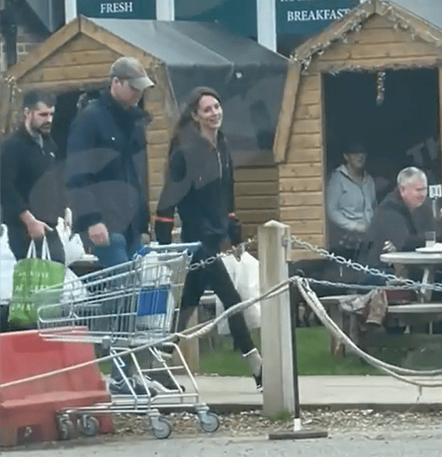 Kate looked relaxed as she strolled carrying her own shopping