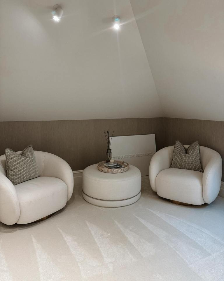 The room follows an all white interior