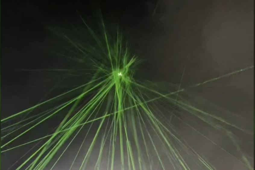 The terrifying moment hundreds of festivalogoers descended their lasers upon their plane