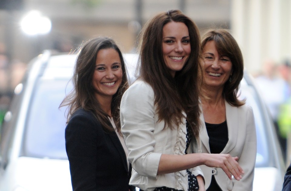 Pippa and Kate with their mother Carole in April 2011