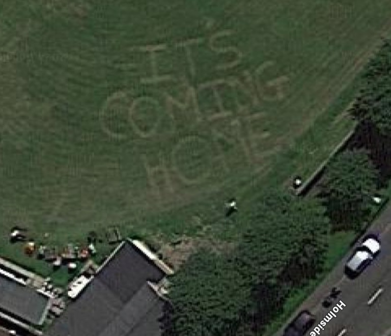 Die-hard England fan cut 'It's coming home' into the grass of his local cricket club ground