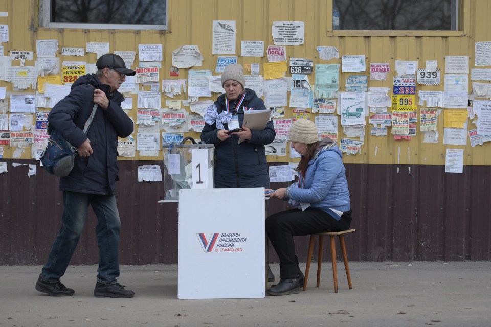 People cast their votes at a mobile polling station in Russian-controlled Donetsk region, Ukraine