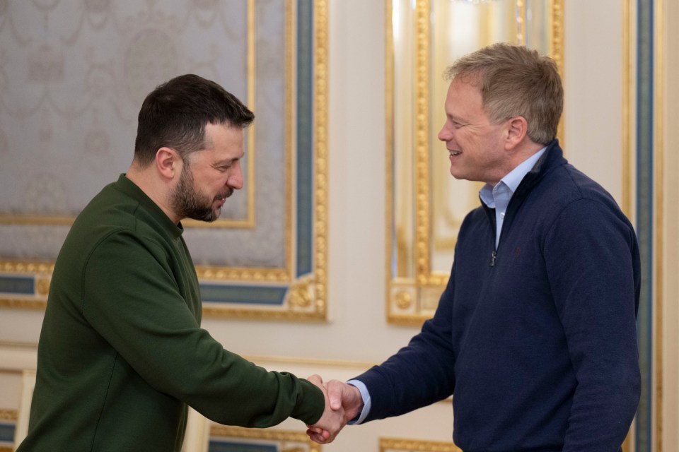 Ukrainian President Volodymyr Zelenskyy, left, and Britain’s defence secretary Grant Shapps shake hands during their meeting in Kyiv, Ukraine on March 7