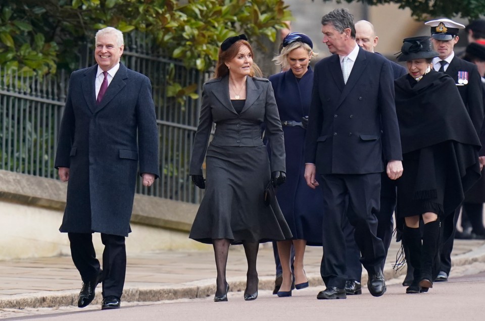 Prince Andrew grinning as he leads the royals to a service last month