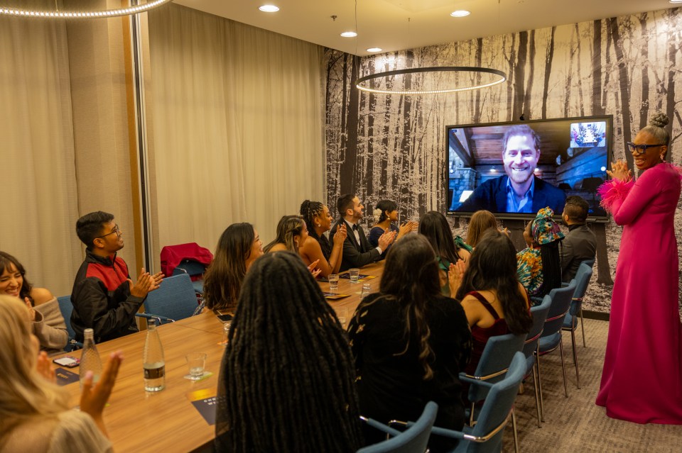 Prince Harry chatted with youngsters over a video link at the event