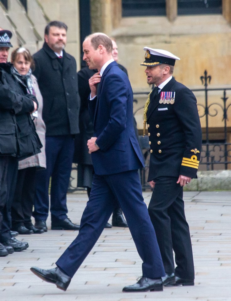 Prince William covered his tie with one hat during his arrival at the Commonwealth event