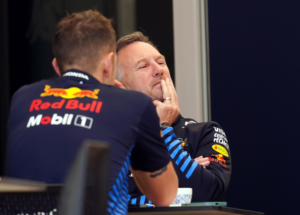 The embattled F1 chief folded his arms as he sat with teammates