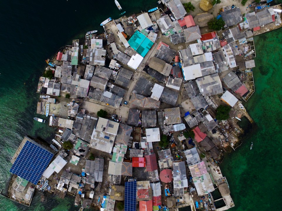 A view from above shows the crammed tinned roofs next to each other