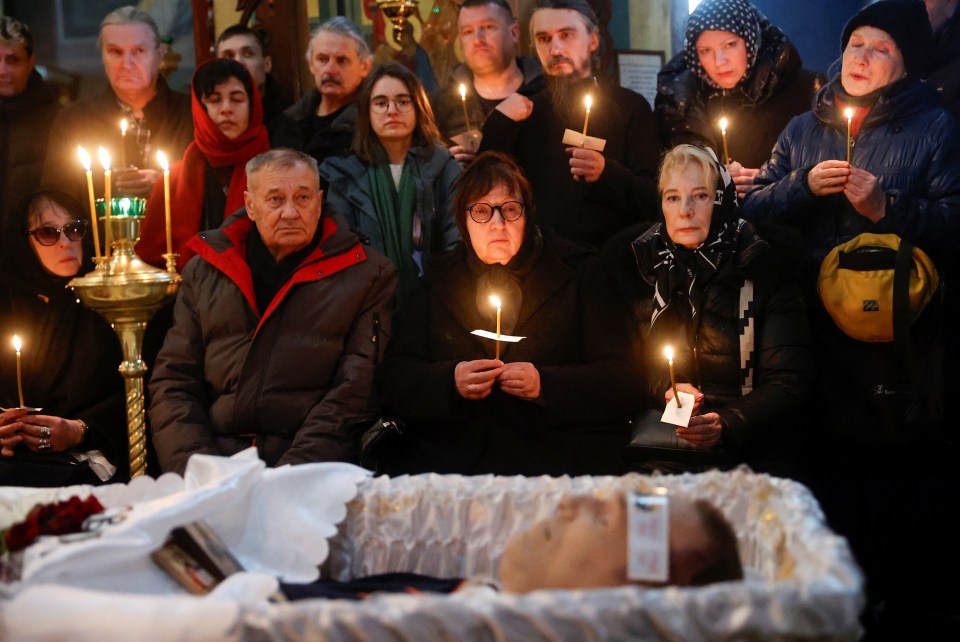 Navalny's parents attend the funeral service for their son