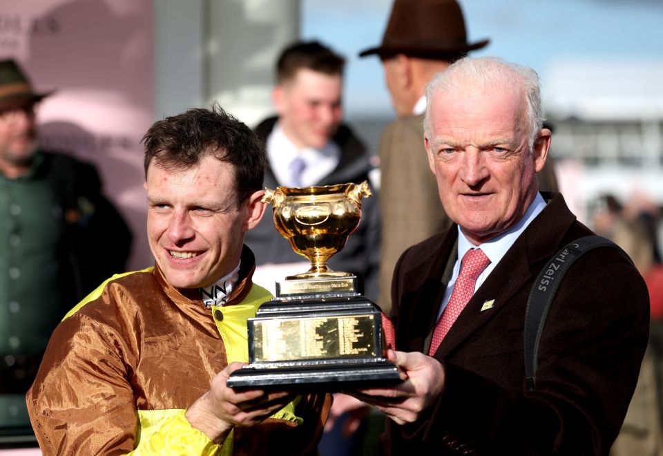 Top trainer Mullins, right, with last year's Gold Cup - he'll be the trainer they all have to beat this year