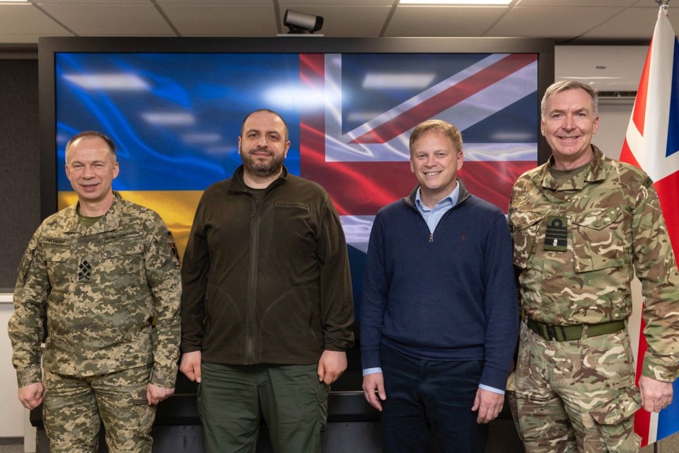 Ukraine's defence minister Rustem Umerov and Armed Forces commander in chief Col Gen Oleksandr Syrskyi stand with Britain's Grant Shapps and Adm Sir Tony Radakin