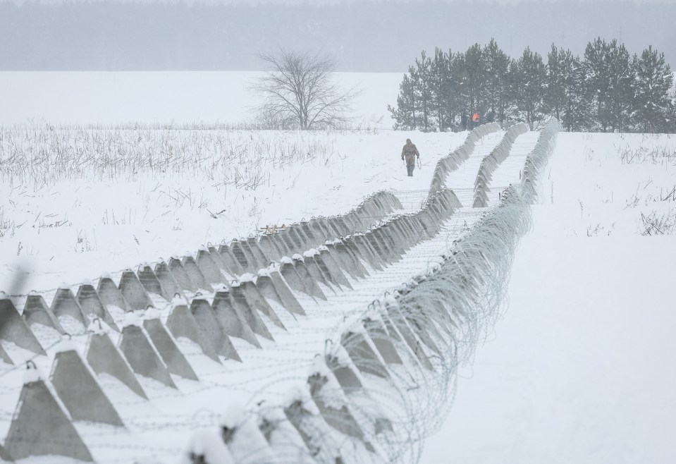 Snow-covered dragon's teeth - which serve to stop waves of Russian tanks from encroaching on Ukrainian territory