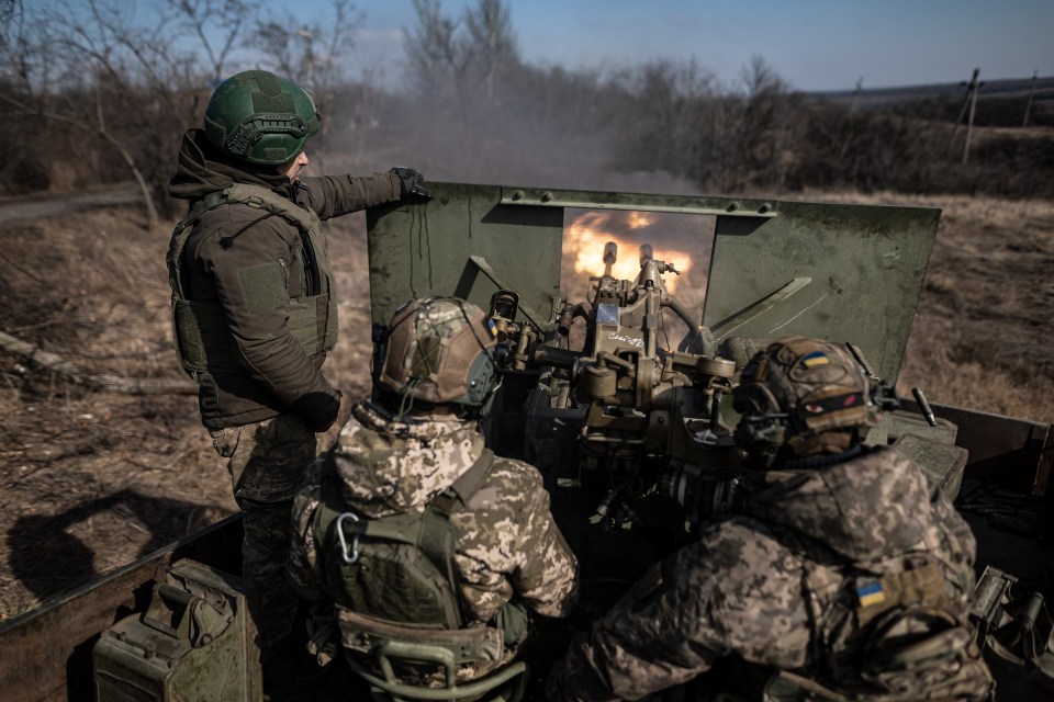 Ukrainian soldiers gear up in a fighting position near Bakhmut just days ago