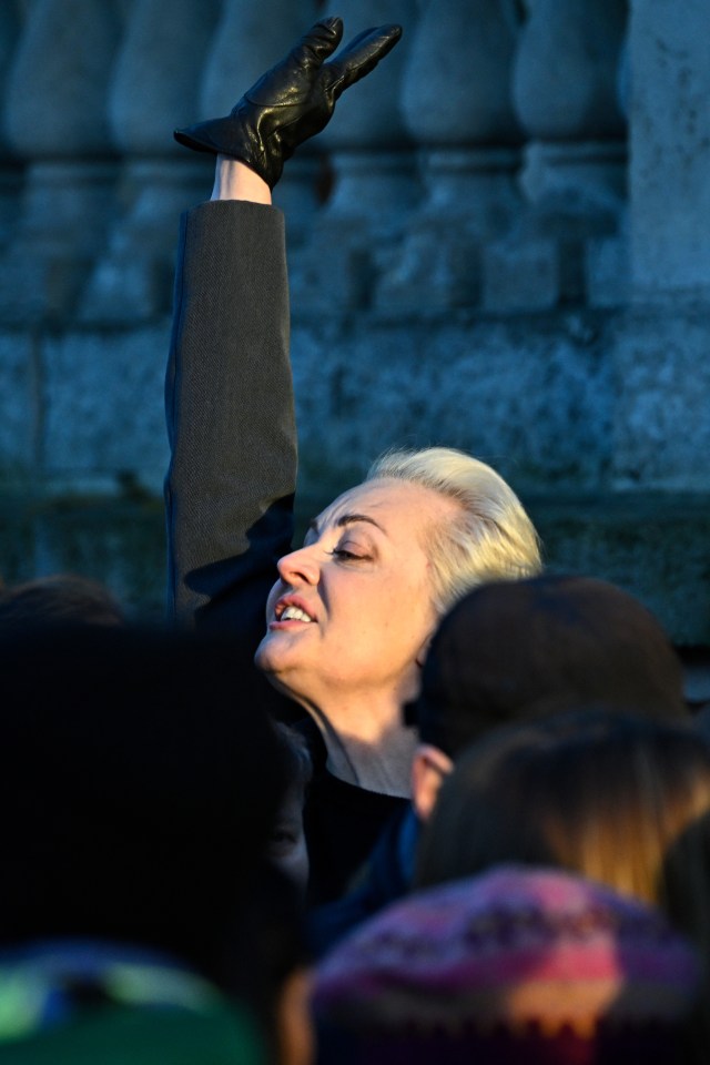 Yulia queues to enter the Russian embassy in Berlin this evening