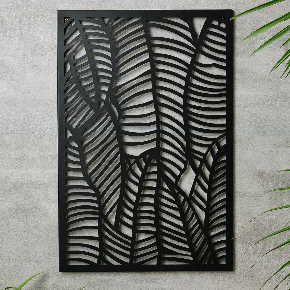 This £8 metal wall art is a simple way you add some mono charm to your garden wall