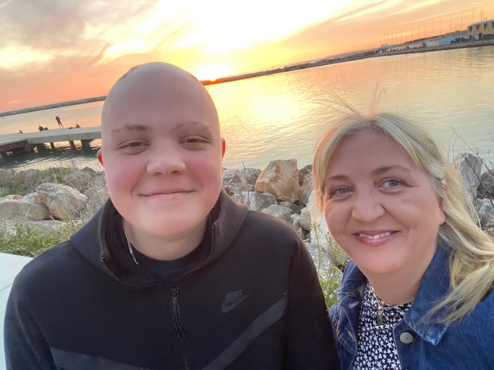 Zak and his mum Natasha, who says it was "traumatic" to pick up clumps of his hair from the floor