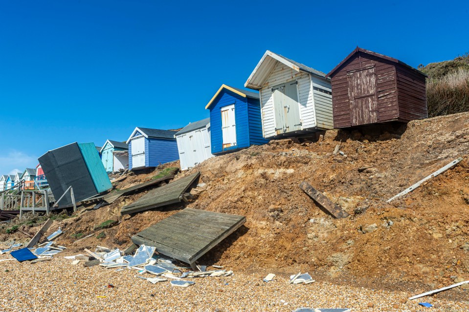 A row of huts was left teetering on the brink in Hampshire