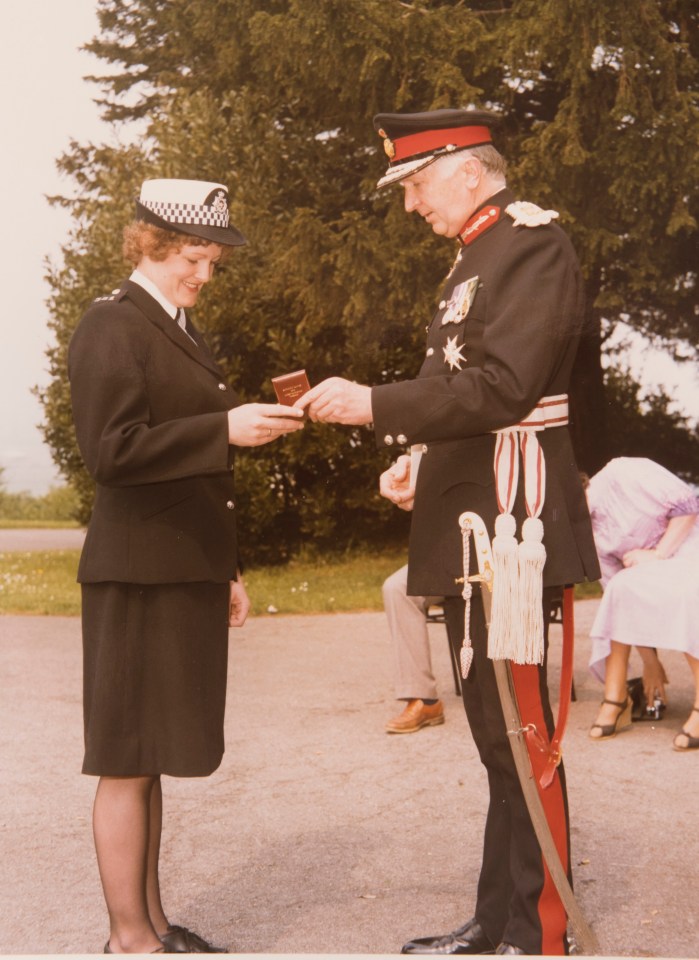 Michelle receiving the brave conduct award in 1980