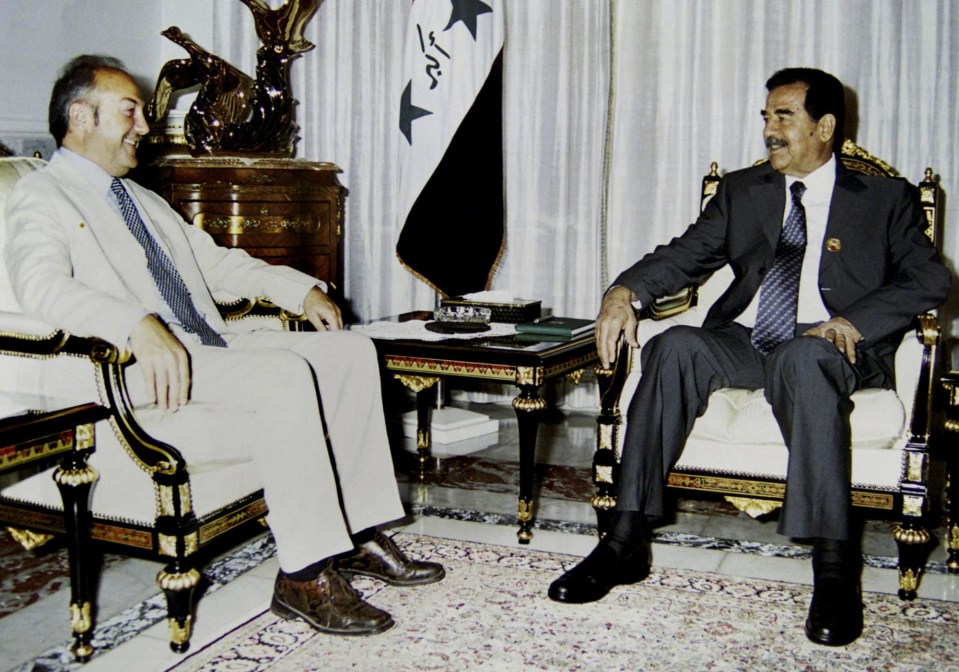 Galloway with Saddam Hussein in 2002