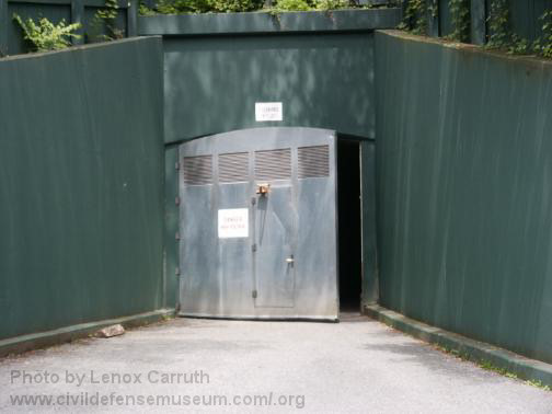 The West entrance door to the bunker, above which is a ‘high voltage’ sign