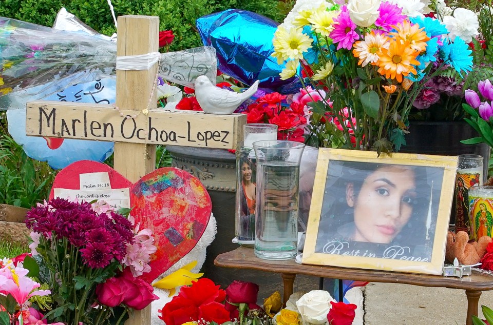 Flowers, balloons, and a photo of victim Marlen are laid at a memorial for the mum