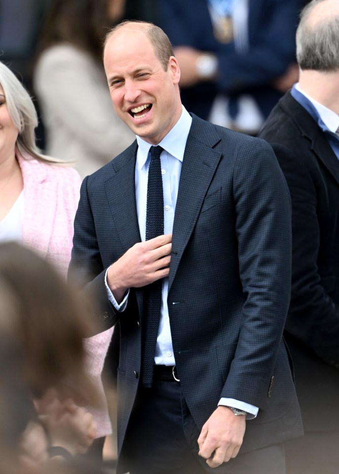 The royal laughed as he met with staff and pupils at the heartwarming event