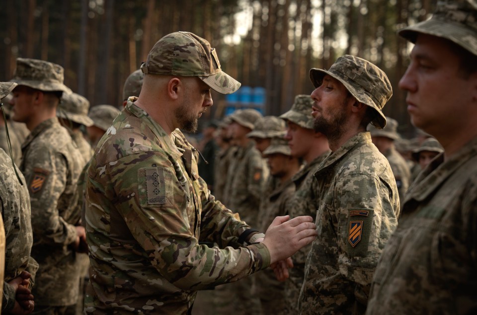 Newly recruited soldiers being briefed for war in Ukraine