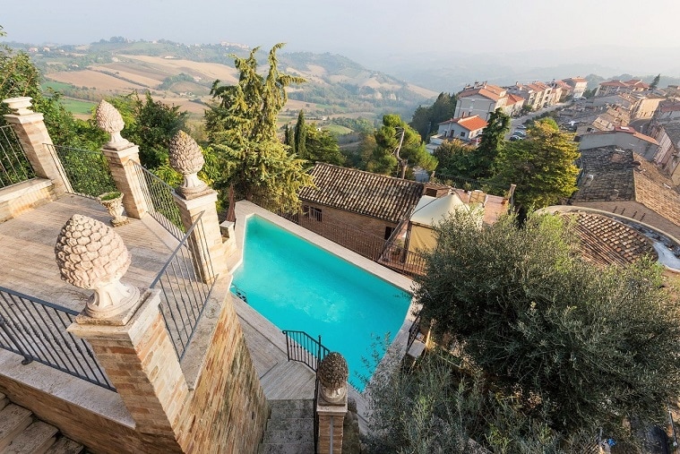 Two swimming pools can be found overlooking the Italian countryside