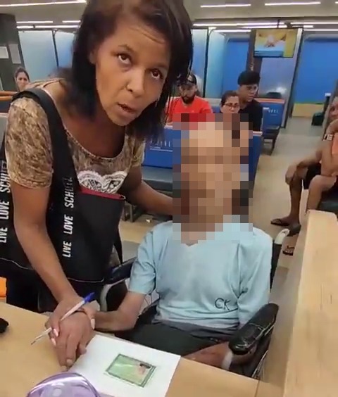 A woman pretended to have a conversation with her dead uncle at the bank counter