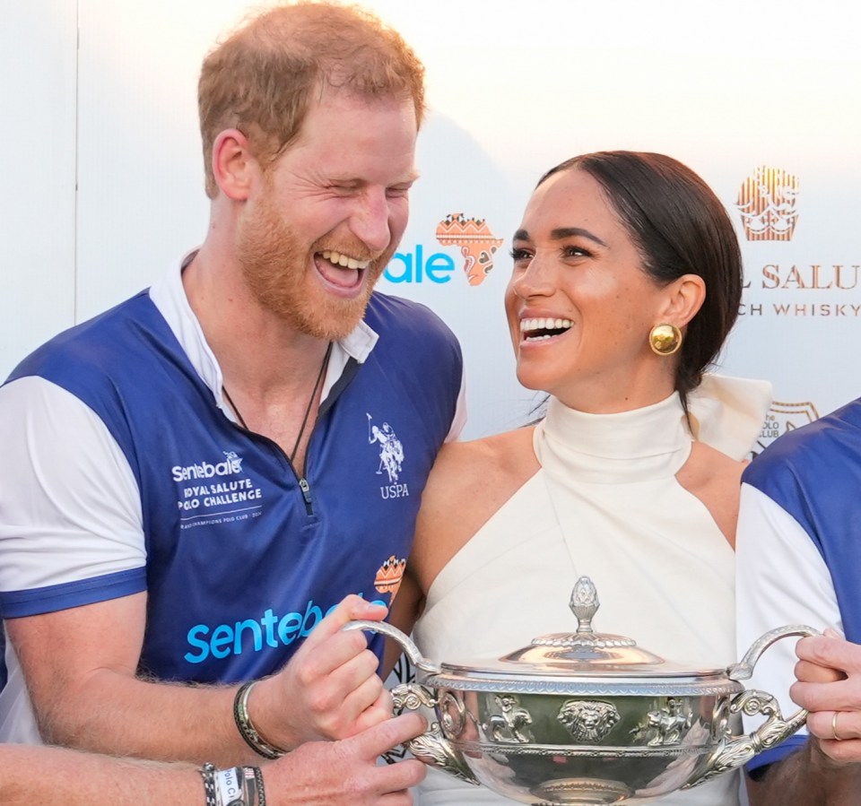 The Prince was also presented with a cup by Meghan