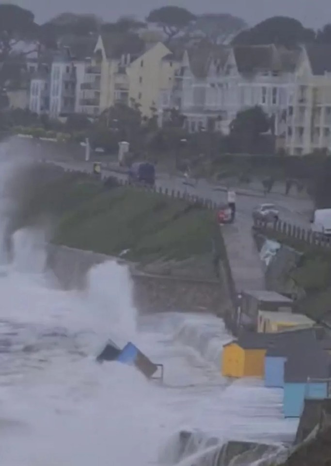 Colourful huts washed into the scene at Castle Beach, Falmouth, too