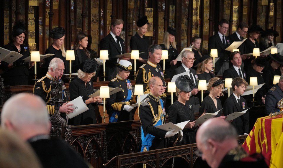 Sir Tim (centre) with sister Princess Anne to his right and Prince Andrew to his left at The King George VI Memorial Chapel