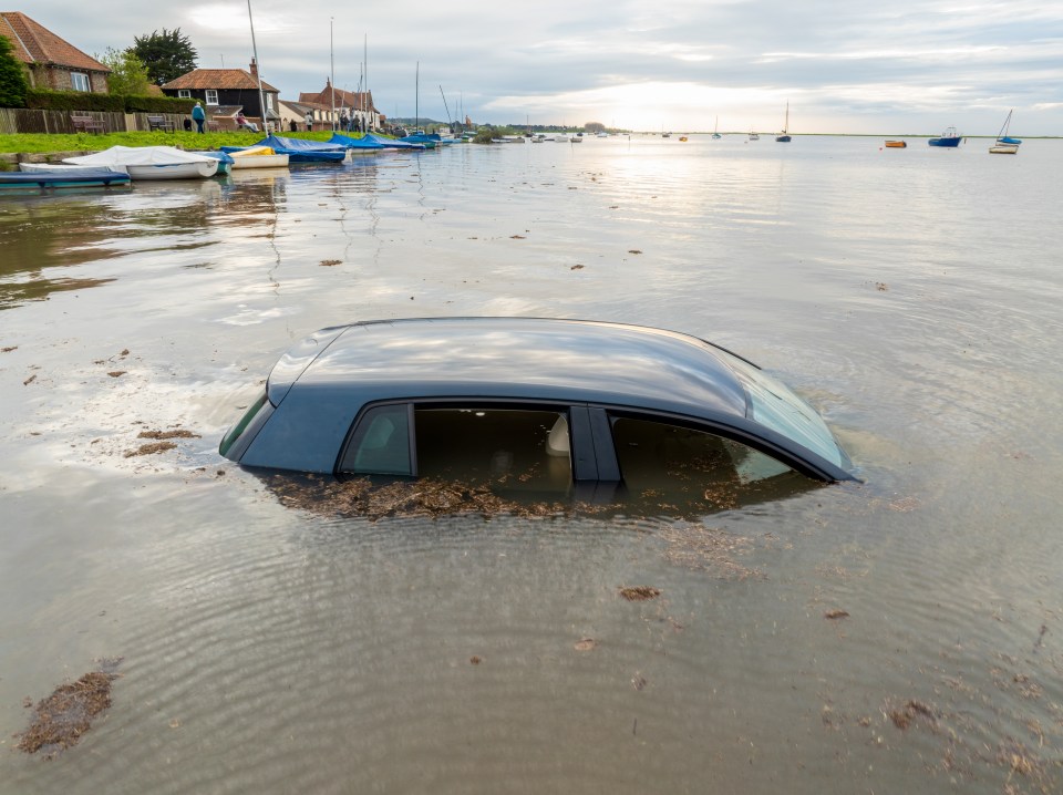 A VW Golf was caught out by the tidal surge caused by the storm