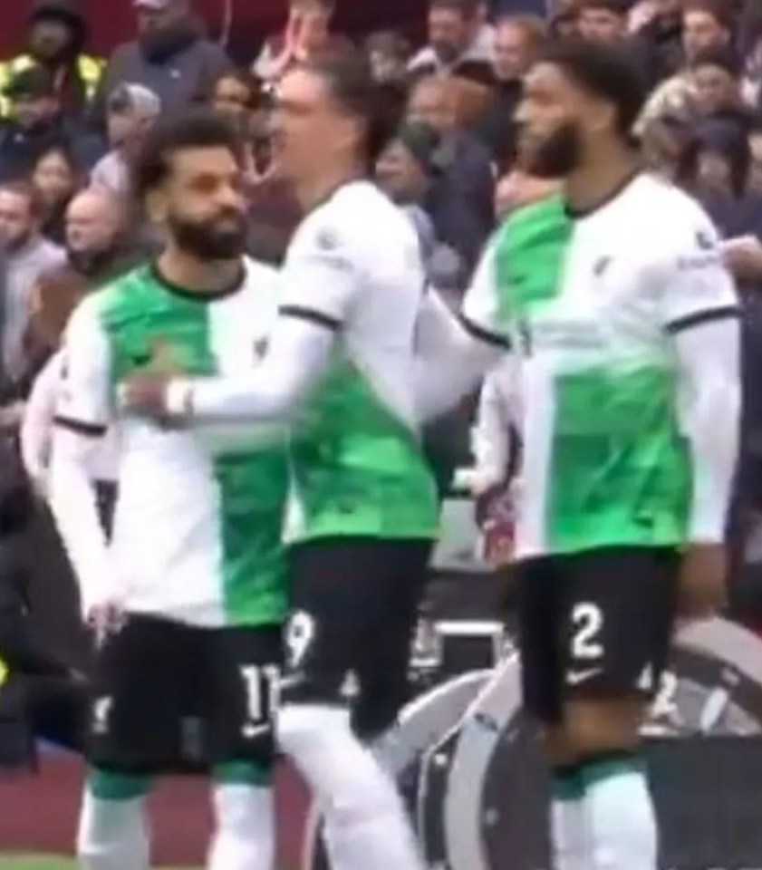 A furious Salah had to be held back by his team-mates after trying to confront the German