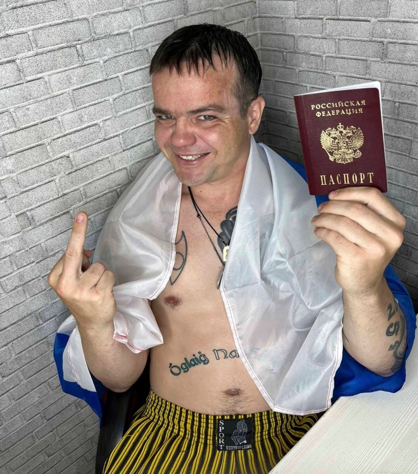 British “traitor” Aiden Minnis (left), 37 from Chippenham, who “hates” the UK and is  fighting against Ukraine, claims he has been granted a Russian passport by Vladimir Putin.