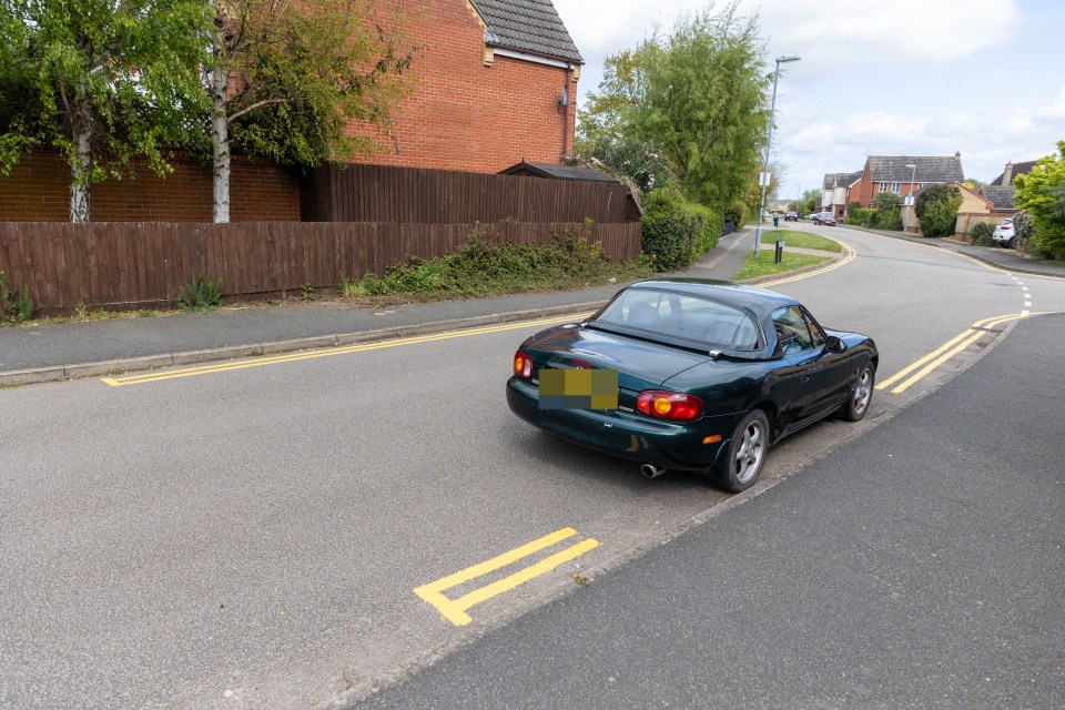 Picture supplied by Cambs News/Bav Media 07976 880732.. .Picture dated April 20th shows the yellow lines in Witchford,Cambs, which were painted around parked cars...A council has been slammed for painting yellow lines AROUND parked cars in a village in Cambridgeshire  with one section just ONE-METRE long...Residents say they are confused about where they can park after council contractors left gaps where cars were parked in Witchford...The double yellow lines have been put on a number of roads to address parking issues in the area, after a request from the parish council, according to Cambridgeshire County Council...But some of the lines only measure a metre long because cars were in the way when the contractors visited  and residents say they now dont know where they can legally park... .See copy catchline Council slammed for one-metre yellow lines