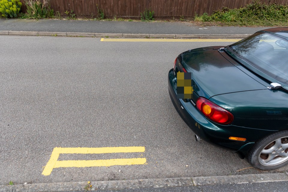 Picture supplied by Cambs News/Bav Media 07976 880732.. .Picture dated April 20th shows the yellow lines in Witchford,Cambs, which were painted around parked cars...A council has been slammed for painting yellow lines AROUND parked cars in a village in Cambridgeshire  with one section just ONE-METRE long...Residents say they are confused about where they can park after council contractors left gaps where cars were parked in Witchford...The double yellow lines have been put on a number of roads to address parking issues in the area, after a request from the parish council, according to Cambridgeshire County Council...But some of the lines only measure a metre long because cars were in the way when the contractors visited  and residents say they now dont know where they can legally park... .See copy catchline Council slammed for one-metre yellow lines