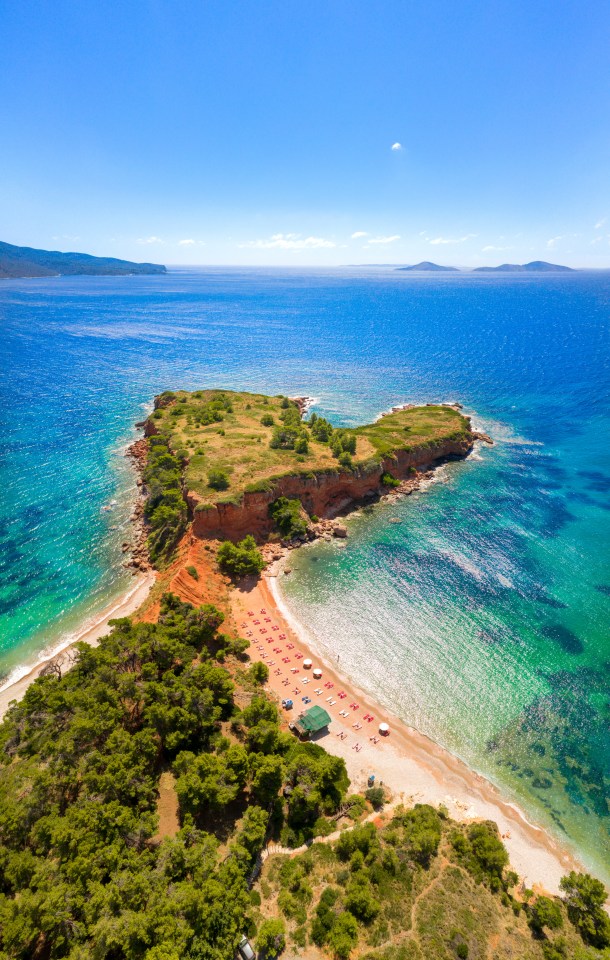 Amazing beach of Kokkinokastro with orange sand in Alonnisos island, Sporades, Greece.