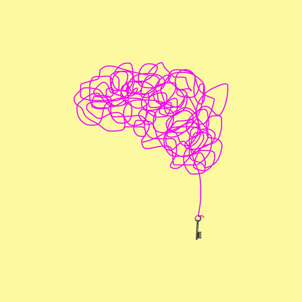 Key at end of brain shaped tangled string