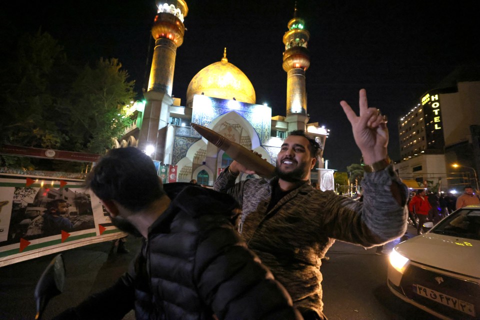 Demonstrators gather at Palestine Square in Tehran on April 14, 2024, after Iran launched a drone and missile attack on Israel. Iran's Revolutionary Guards confirmed early April 14, 2024 that a drone and missile attack was under way against Israel in retaliation for a deadly April 1 drone strike on its Damascus consulate. (Photo by ATTA KENARE / AFP) (Photo by ATTA KENARE/AFP via Getty Images)