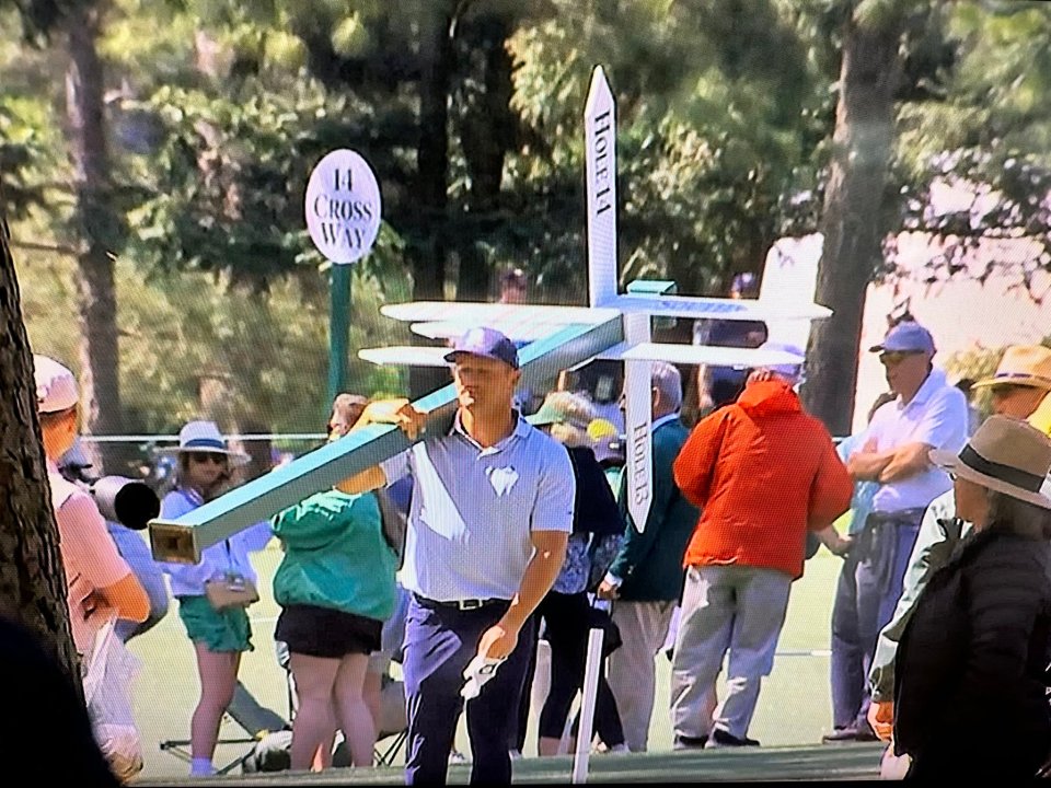 Bryson DeChambeau was seen carrying a large sign around