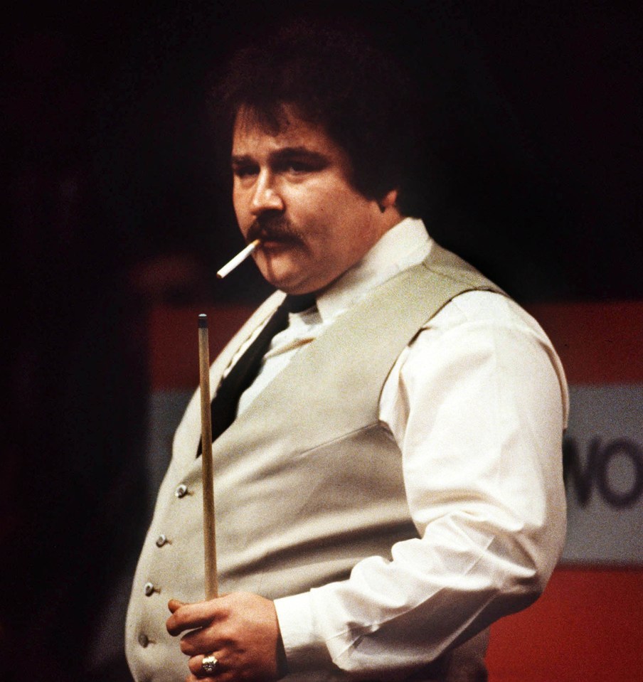 Werbeniuk puffs on a cigarette during the World Championships