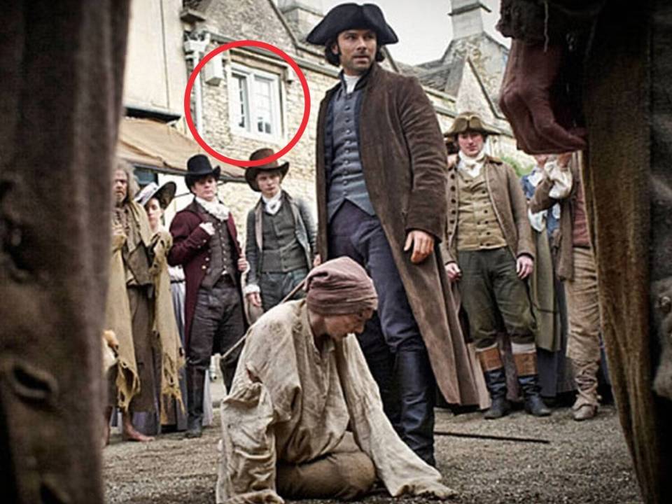 A burglar alarm appears on an 18th century fisherman's home in Poldark