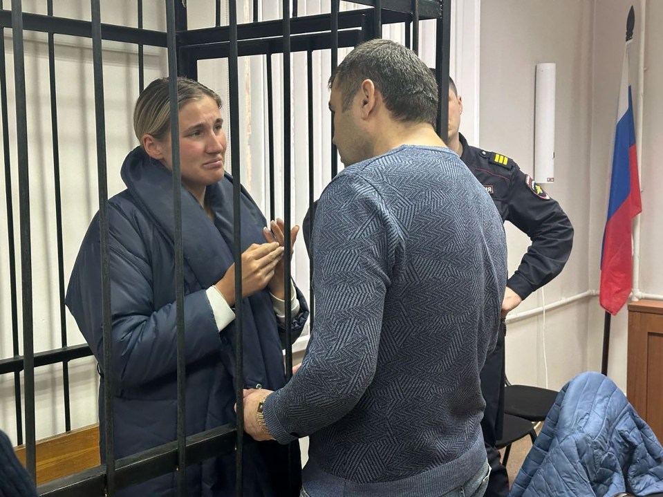 Alena Agafonova, 23, weeping after being convicted of the 'Rehabilitation of Nazism' by a Russian court today