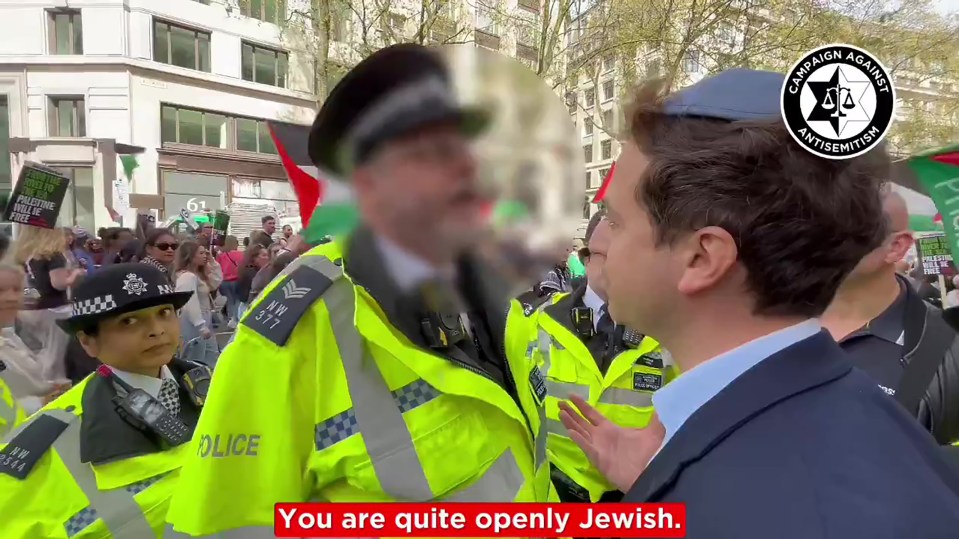 Gideon Falter, who heads up a leading Jewish campaign group, was pulled aside by police and accused of 'antagonizing' pro-Gaza marchers by being 'openly Jewish'