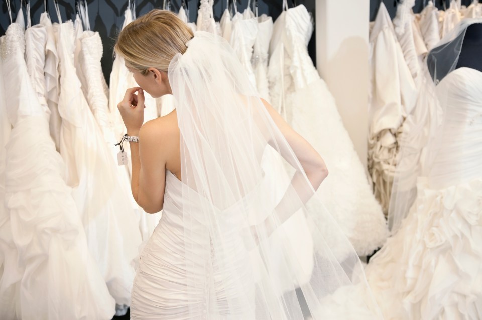 A budget bride has revealed how she cut the costs of her big day